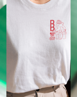Close-up of Buddy Buddy x Oatly pop-up event t-shirt with custom red illustration and logo.